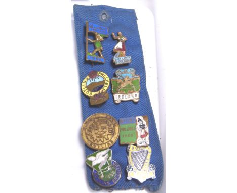 BUTLINS BADGES. Eight Butlins enamel badges from the 1950s