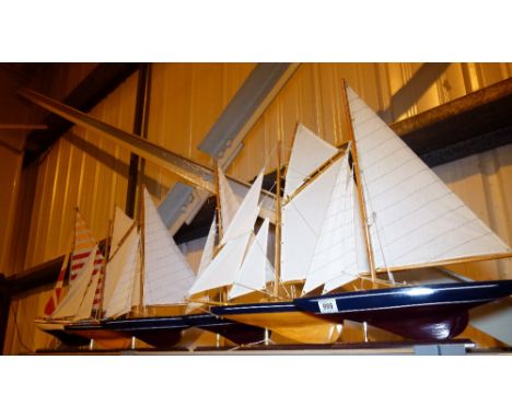 MODEL SAILING VESSELS. Six fully rigged decorative wood sailing vessel models, various sizes