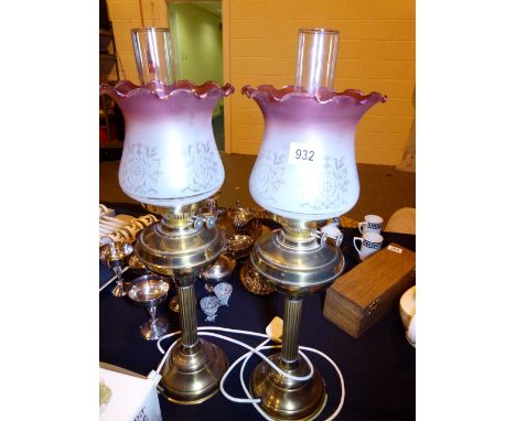 BRASS OIL LAMP STYLE TABLE LIGHTS. Pair of brass column electric oil lamp style table lights with etched cranberry flared gla