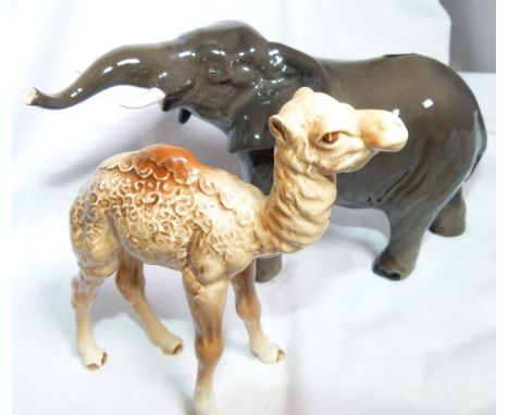 BESWICK ANIMALS. Two Beswick animals, one an elephant with raised trunk and the other a camel