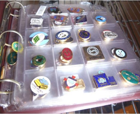 ENAMEL BADGES. An album of approximately 200 enamel badges