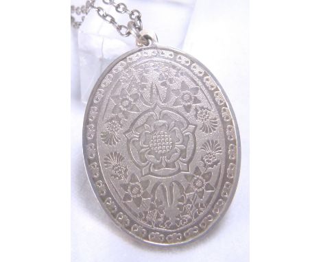 SILVER PENDANT. Silver pendant and chain boxed and original paperwork Elizabeth R commemorative