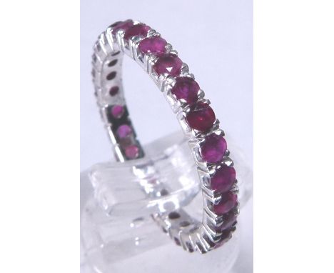 RUBY ETERNITY RING. White metal, presumed gold, eternity ring with rubies, size M, 2,1g