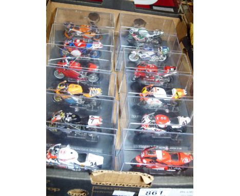 MODEL MOTORCYCLES. Twelve boxed model racing motorcycles, all different