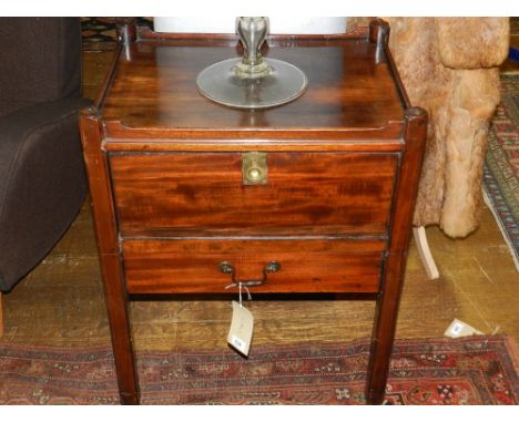 A 19th century mahogany tray top commode, with a fall enclosing a void interior above a drawer, W. 60cm