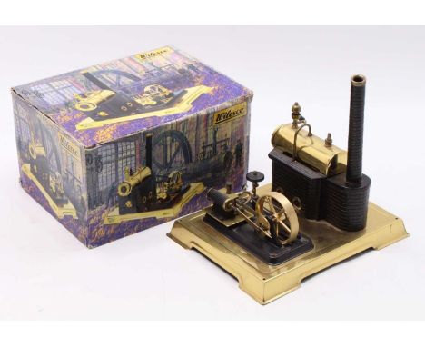 Wilesco D106 stationary steam engine with safety valves, pressure gauges, powering a single cylinder engine with ball governo