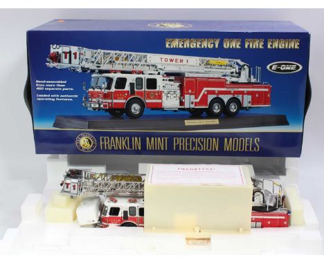 A Franklin Mint 1/32 scale diecast model of the Emergency One fire engine comprising red body with Tower One crane, housed in