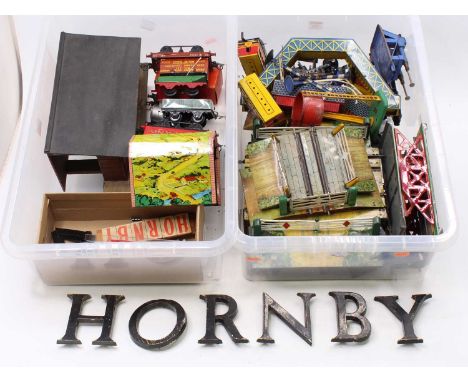 Two plastic trays containing mainly Hornby items: 1930-3 No.2 clockwork level crossing (G-VG); pre-war No.1 &amp; ‘M’ clockwo