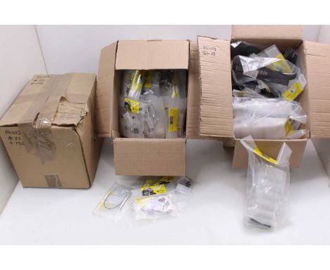 Three boxes containing a quantity of various De Agostini Valentino Rossi 1/4 scale factory issued spare parts and components,