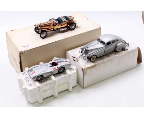 A collection of three boxed Franklin Mint 1/24 scale diecasts to include a 1954 Mercedes Benz W196R, together with a 1933 Pie