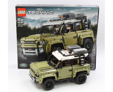 Lego Technic No. 42110 Land Rover Defender, a built example complete with the instruction booklets and a very clean box, the 