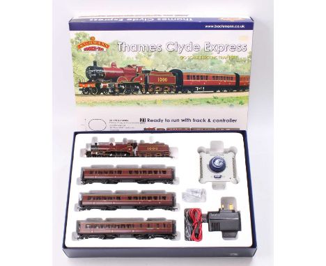 A Bachmann 00 gauge Thames Clyde Express 21 DCC train set, housed in the original polystyrene packed box with control unit, p