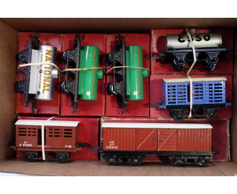 Seven Hornby post-war goods wagons, all post-war none are No.50 style: four tanks – National; Esso; two Manchester Oil, No.2 