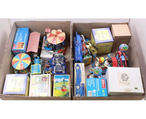 Two trays containing a quantity of Wilesco, Schylling, MGRS and similar, fairground and amusements tinplate toys and accessor