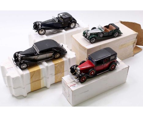 A collection of four boxed Franklin and Danbury Mint 1/24 scale diecasts to include a Franklin Mint Mercedes Benz 77K Grosser