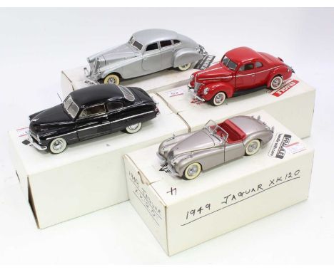 A collection of four various boxed 1/24 scale Danbury Mint diecast vehicles, to include a 1933 Pierce Silver Arrow, a 1949 Me