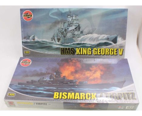 An Airfix 1/400 scale factory sealed military ship group to include HMS King George V, and The Bismarck, both factory sealed 