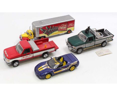 A collection of four various mixed scale Franklin Mint diecast vehicles to include an Indianapolis 500 limited edition 1998 C