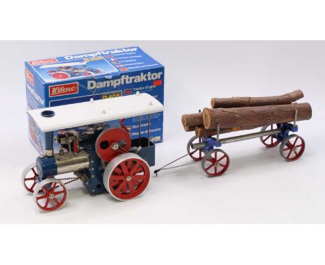 A Wilesco No. D405 Traction Engine comprising blue &amp; red body housed in the original pictorial sided card box, very littl