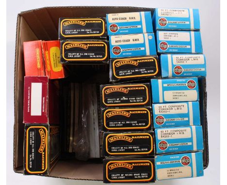 Twenty boxed and six unboxed 00-gauge coaches. 7 Airfix LMS; 2 Airfix GWR Autocoach; 8 Mainline Collett GWR; one Dapol LMS; 2