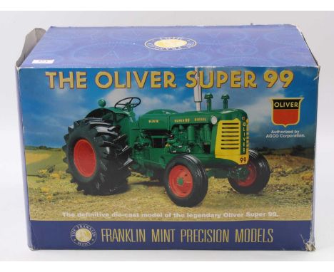 A Franklin Mint Precision Models 1/12 scale diecast model of The Oliver Super 99 tractor, finished in green and yellow, house