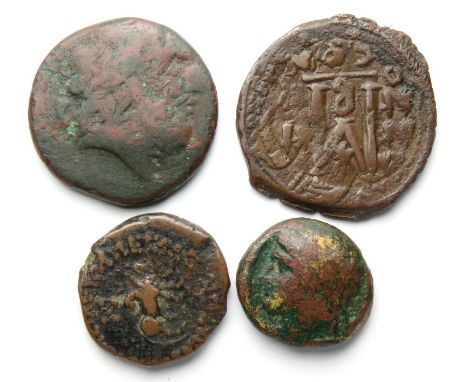 Ancient Bronze Coin Group. (4) including Greek and a Byzantine follis of Heraclius and Heraclius Constantine with old ticket 