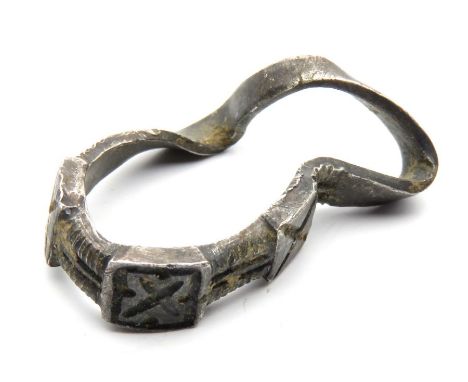 Medieval Ring.  Circa, 12th-13th century AD. Silver, 24mm x 16mm x 5mm (distorted hoop), 3.0g. A scarce type of finger ring, 