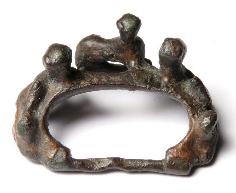 Norman Buckle.  Circa, 12th-13th century AD. Copper-alloy, 13.86 g, 35.14 mm. An impressive Romanesque zoomorphic buckle. For