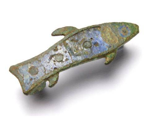 Roman Zoomorphic Brooch.  Circa, 2nd century AD. Copper-alloy, 4.28 g, 32.05 mm. A plate brooch in the form of a fish with th