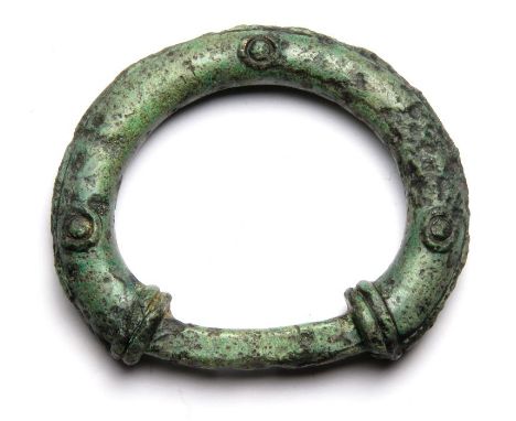 Celtic Terret Ring.  Circa, 100 BC-100 AD. Copper-alloy, 33.36 g, 51.21 mm. Decorated with three pellet in ring motifs on eac