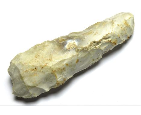 Neolithic Adze.  Circa, 4000 BC-2350 BC. Stone, 143.08 mm, 43.75 mm. A white flint axe found on the Isle of Wight. Ref: for s