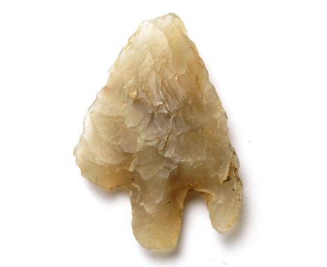 Bronze Age Flint Arrow Head.  Circa, 2350-1600 BC. Stone, 1.76 g, 25.52 mm. Semi-translucent flint tanged and barbed arrowhea