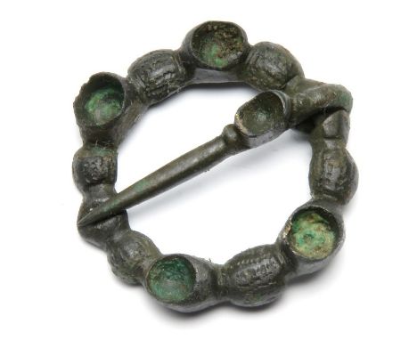 Medieval Brooch.  Circa, 14th century AD. Copper-alloy, 9.94 g, 31.94 mm. An annular brooch of robust construction complete w