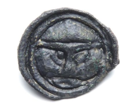 Anglo-Saxon Button Brooch.  Circa, 7th century AD. Copper-alloy,  1.89 g, 15.69 mm. A small circular brooch detailed with a s