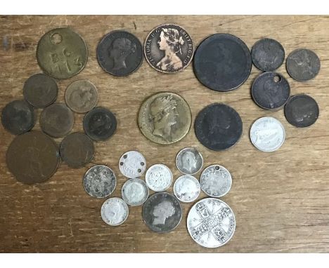 Collection of British and World coins includes Silver coins and a Roman Sestertius, with other coins.