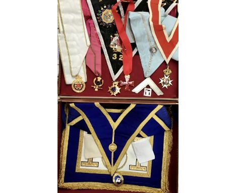 Very Large Collection of Masonic items. Includes hallmarked silver and enamel jewels, ceremonial sword and gowns, aprons, hat