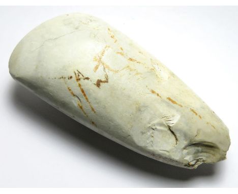 Neolithic Polished Axe.  Circa, 3500-2100 BC. Stone, 122.35 mm, 52.71 mm. A white flint polished axe. Found on the Isle of Wh