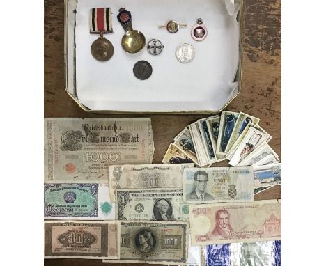 A Collection of World Banknotes, 1912 one penny in higher grade.Faithful Service medal for the Special Constabulary to Walter