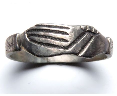 Clasped Hands Ring.  Circa, 16th century. Silver, 2.20 g, 21.85 mm. UK ring size: S. US ring size: 9. A very nice example of 