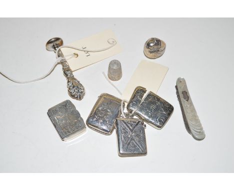 Small silver items, to include: vesta cases; a table seal; a snuff box; mother-of-pearl mounted fruit knife; and a chick patt