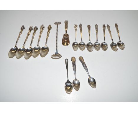 A quantity of Dutch and other silver teaspoons; together with: a cocktail spoon; a sugar trowel; etc.