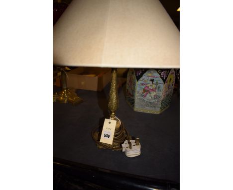 An early 20th Century brass table lamp with onyx band to base.