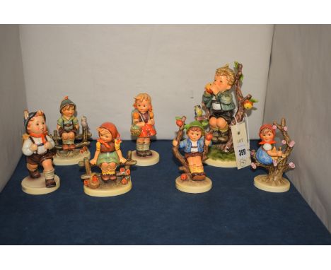 Hummel figures, to include: 'An Apple A Day'; 'School Girl'; 'Just Resting'; 'Apple Tree Girl'; etc.  (7)