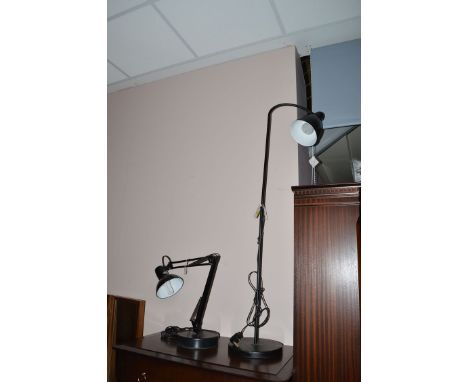 A black metal anglepoise lamp; together with a floor standing lamp.

