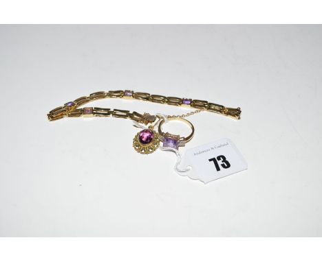 A 9ct. yellow gold and amethyst gate-link bracelet; together with a amethyst pendant in giltmetal mount; together with an ame