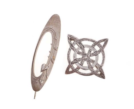 OLA MARIE GORIE, TWO SCOTTISH SILVER BROOCHES,  one of Celtic knot form, the other oval, each signed to the reverse