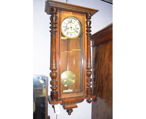 A Gustav Becker Vienna wall clock, enamel roman dial, in walnut case.