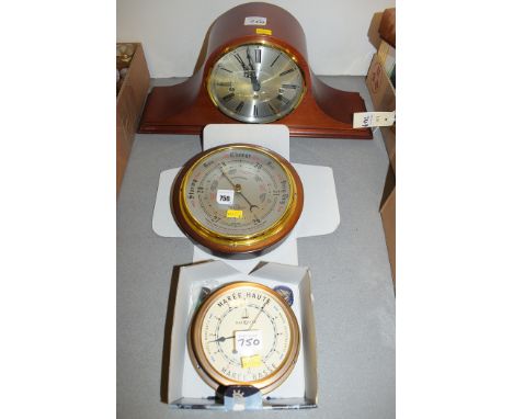 A modern mantel clock in arched mahogany case, with silvered roman dial by Rapport; a modern barometer in stained wood case; 