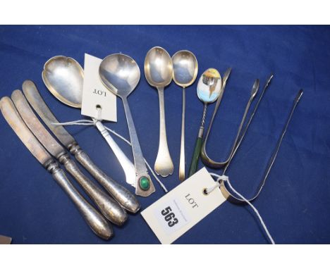A George VI silver spoon, by William Henry Warmington, London 1947, set with green hardstone to handle, in Arts & Crafts styl