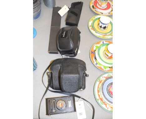 A Kodak autographic camera; a Ricoh 35mm reflex camera, in vinyl case; a Konica super zoom 80 camera; an Olympus Mju camera, 